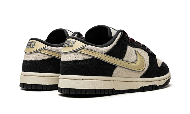 Tênis Nike Dunk Low Feminino "Black Team Gold" Preto / Dourado